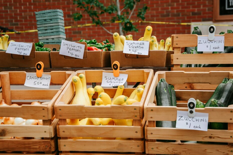 yellow and green vegetables on brown wooden crate